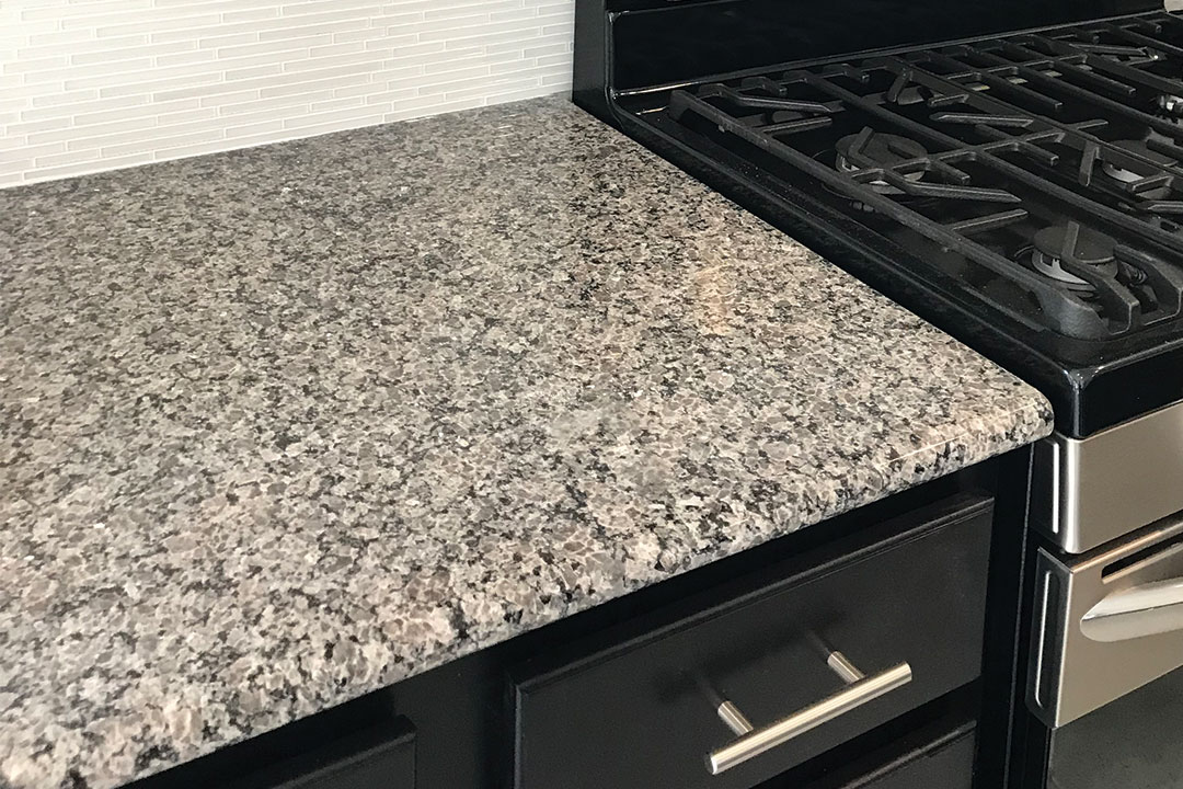 the standard builder-grade granite in the kitchen 